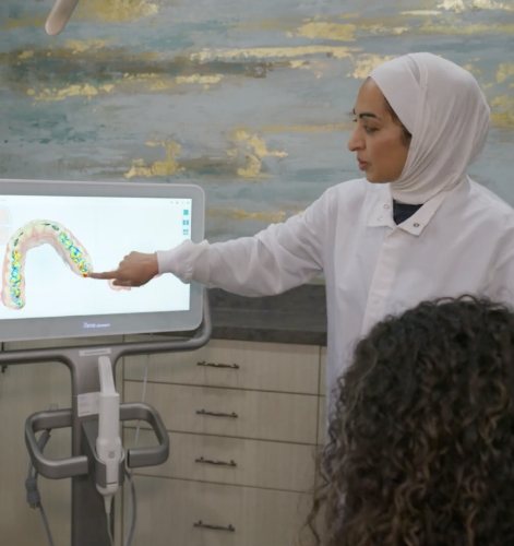 Dr. Iqbal With Patient
